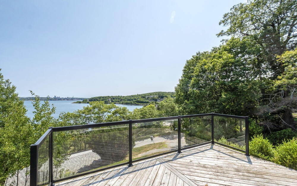 Wooden terrace with a water view